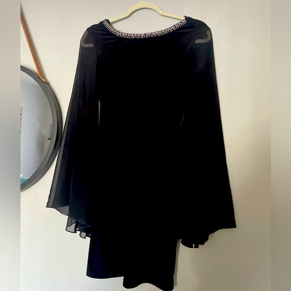 Black, short body-con dress